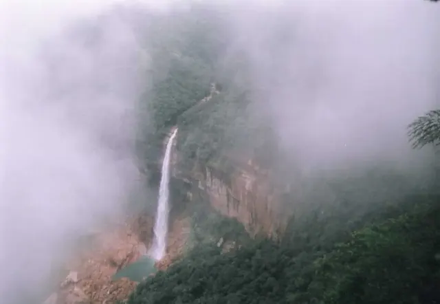 Nohkalikai Falls dropping through the mist near Cherrapunji, Meghalaya